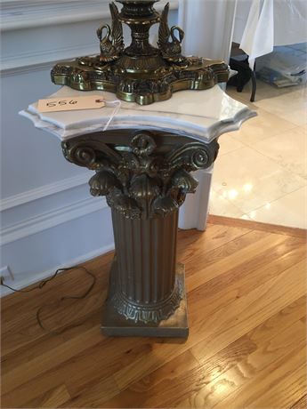 Decorative marble and gold Corinthian pillar