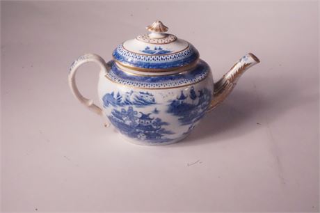 Lot 145.  Early Coalport Teapot by John Rose