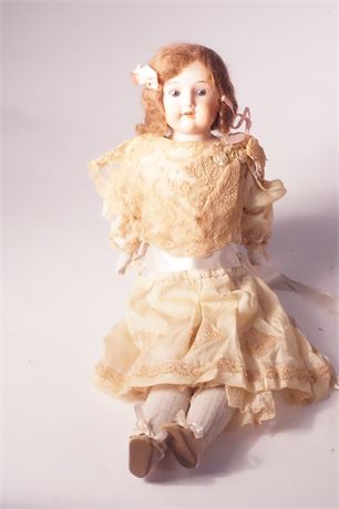 Lot 124. Antique Disque Head Doll