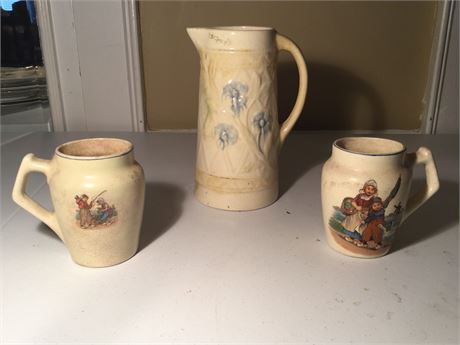 Lot 327.  Three Pieces Roseville Pottery
