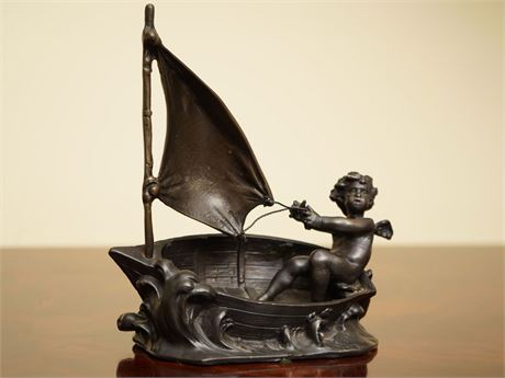 Decorative Bronze, Cherub in a Sailboat