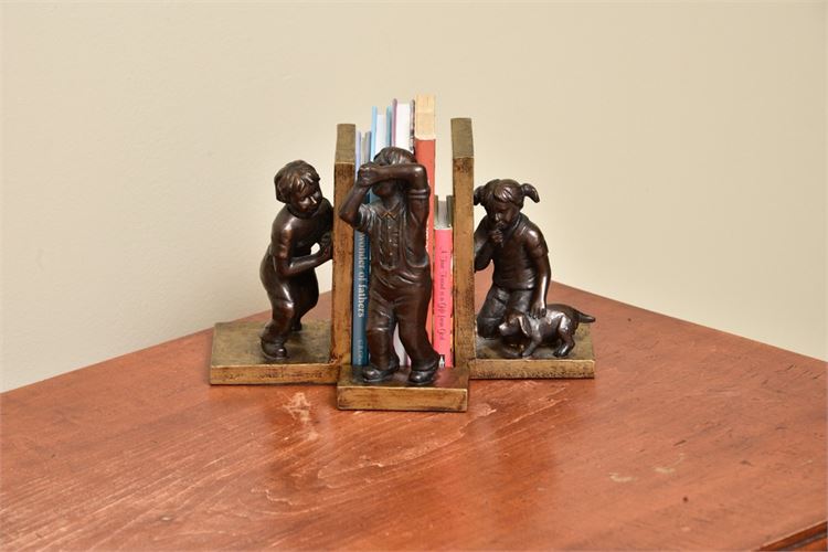 Set Of Figural Bookends with Accompanying Figure