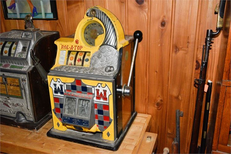 Antique Roll-A-Top 10 cent Slot Machine
