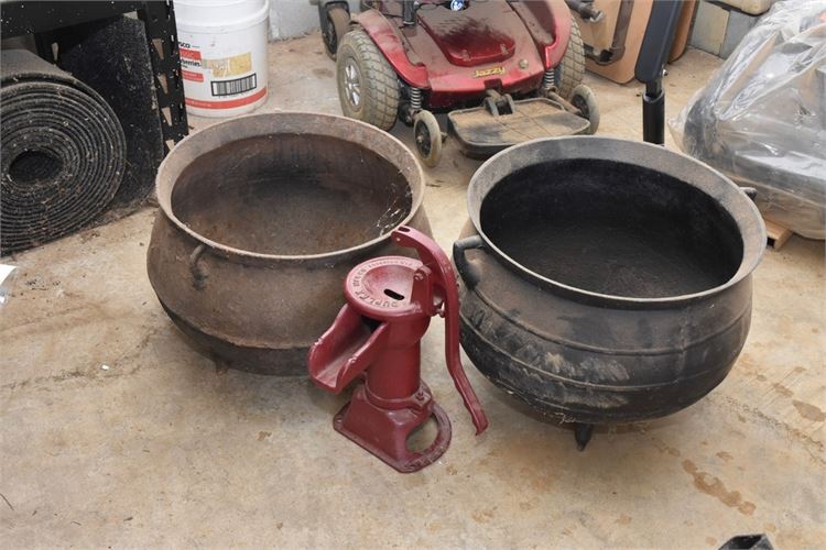 Two large Cast Iron Cauldrons and a Water Pump missing Plunger