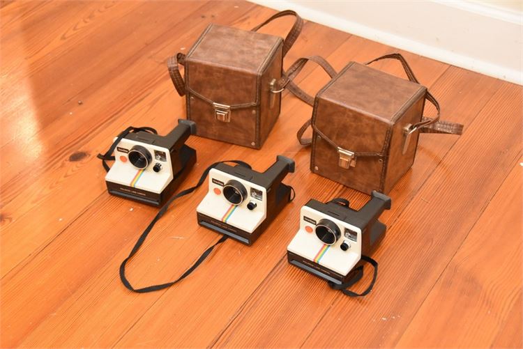 Group, POLAROID Cameras and Cases