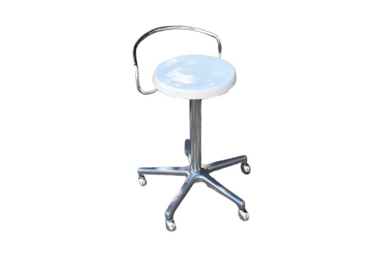 Vintage rolling doctor’s stool, chrome with adjustable white seat.