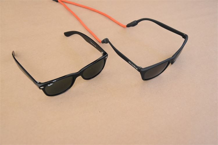 2 pairs of men’s sunglasses. (See description)