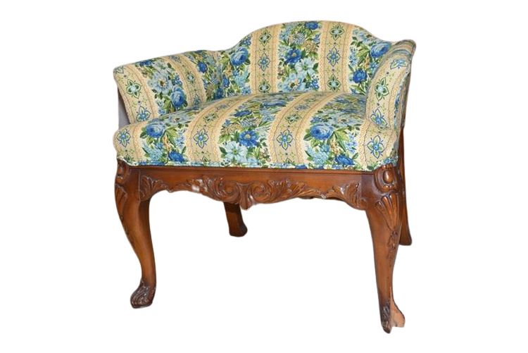 Carved and upholstered Low Chair