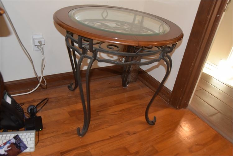 Wood Rimmed Glass Top End Table With Scrolled Metal Base