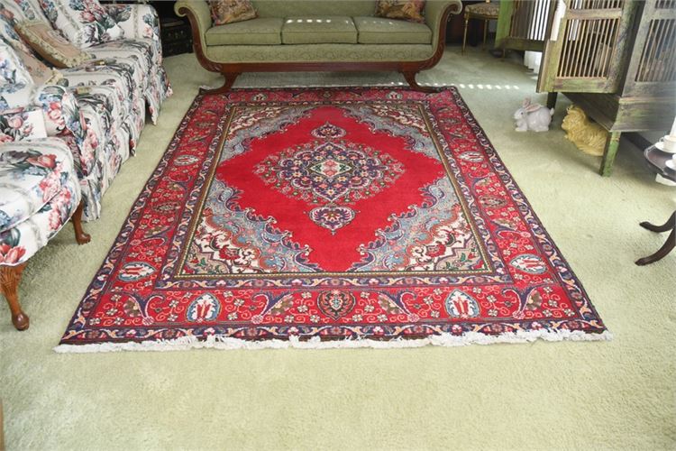 Handwoven Carpet with Central Medallion on Red Ground