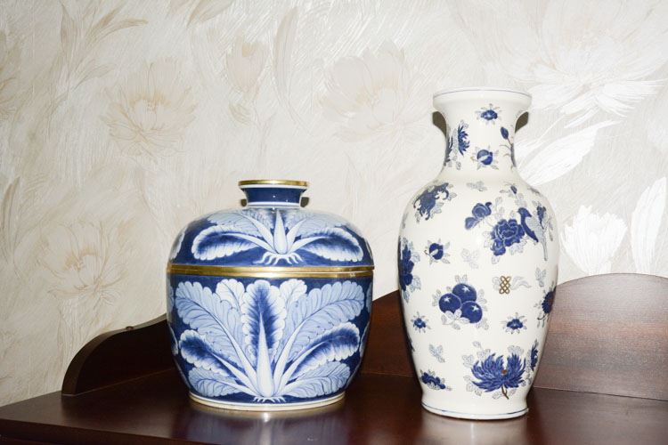 Pair of White and Blue Ceramic Objects