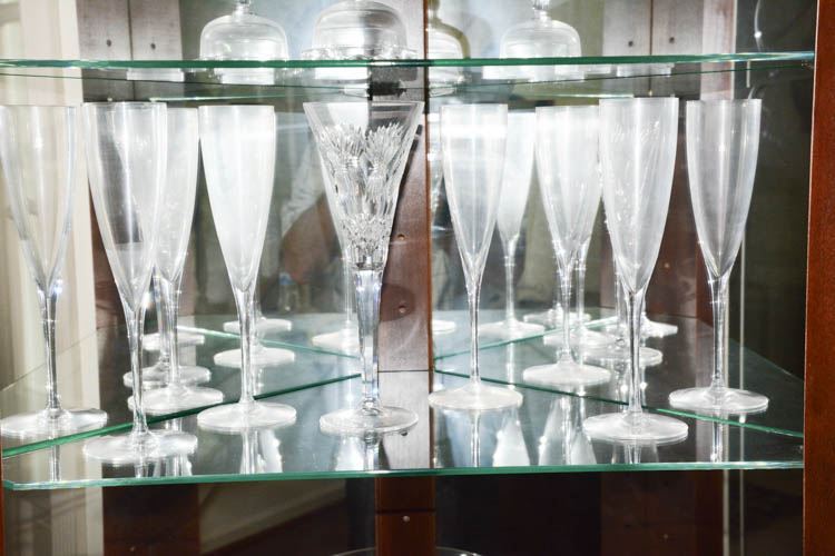 BACCARAT Suite of 4 crystal Champagne flutes and One Waterford